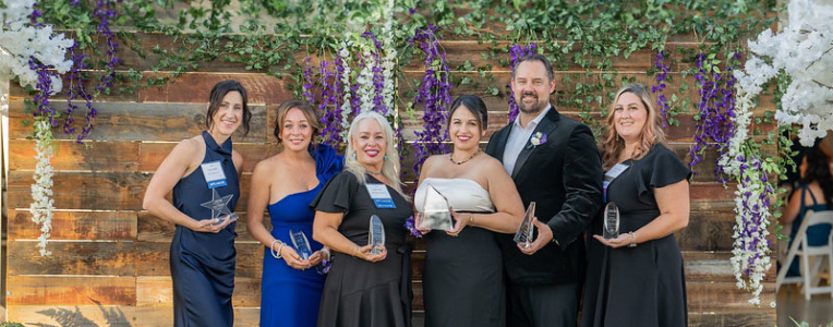 group with their crystal awards
