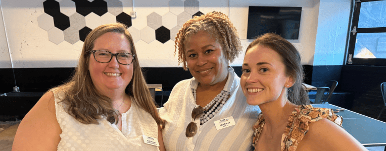 Women at a standing table