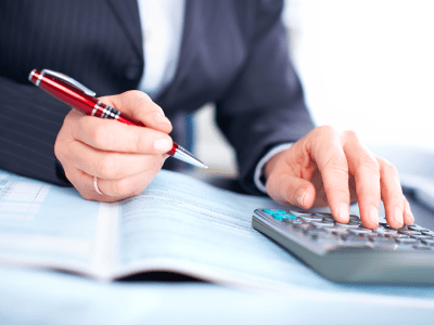 Hands of accountant business woman working with calculator.