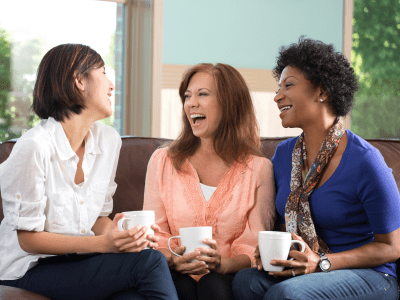 Women having coffee and talking.