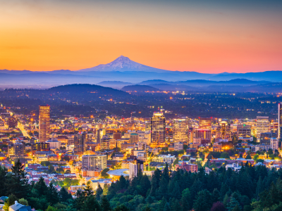 Portland, Oregon, USA skyline at dusk with Mt. Hood in the distance.
