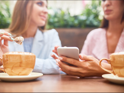 Two women having coffee