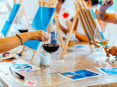 Sip and Paint Event: Women Creating Art over Wine Glasses
