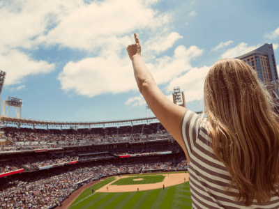 woman cheering at a baseball game