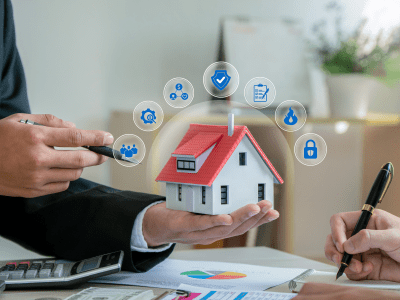 Man insurance agent holding house model with home insurance icon. Property insurance security concept to protect family, real estate from accidents and unexpected disaster.