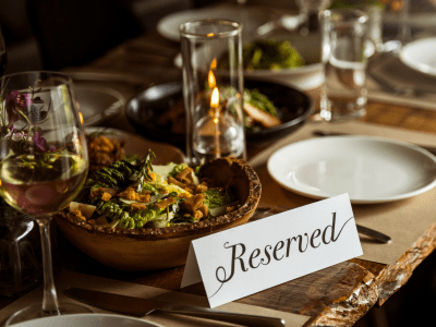 Fancy dinner table setting with reserved table tent.