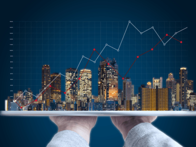 real-estate-business-investment-with-hands-holding-tablet