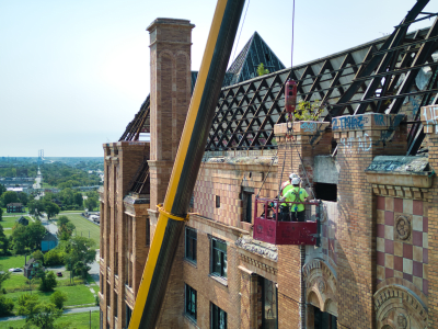 Construction crew working on Lee Plaza building