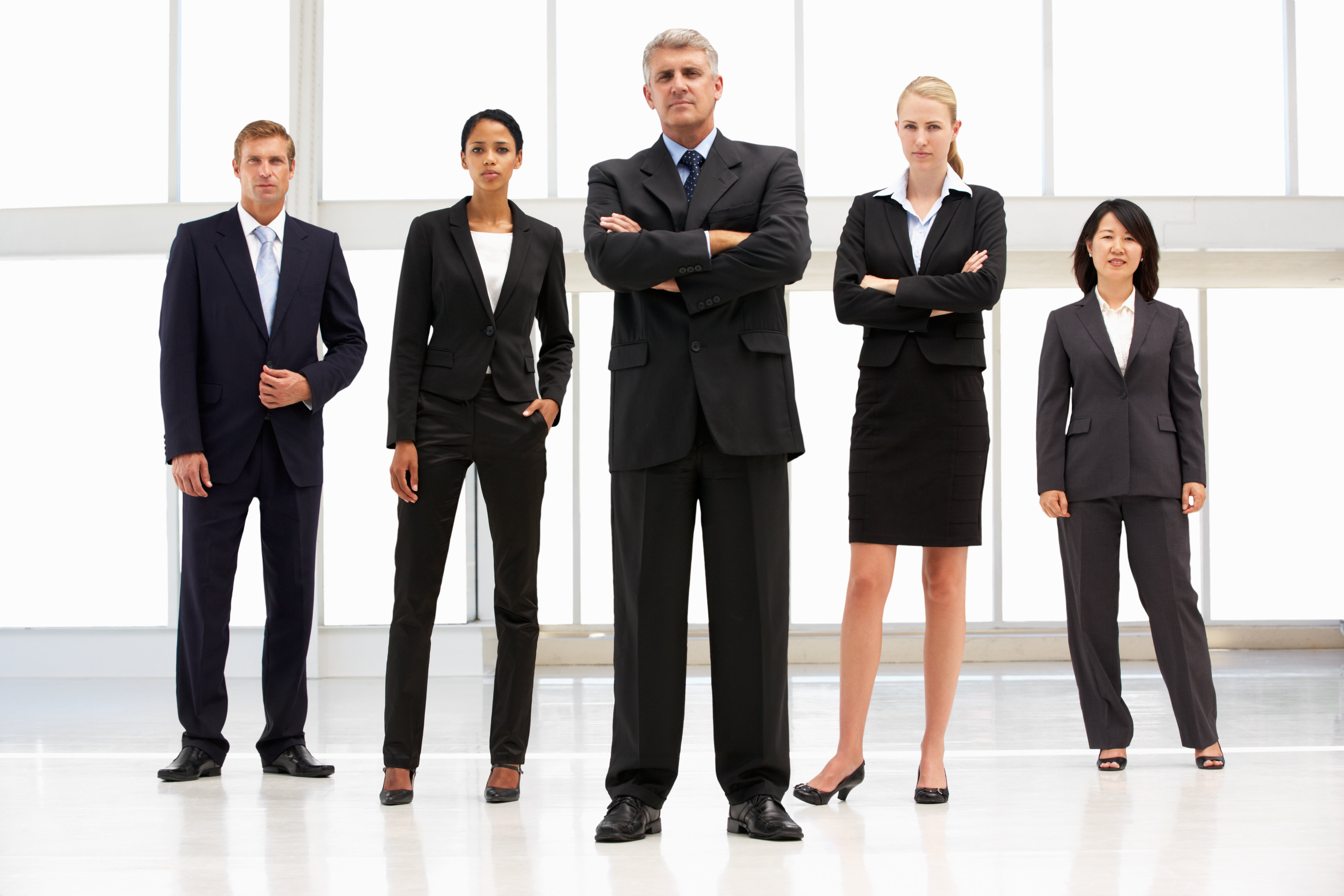 Confident business people standing