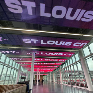 St. Louis City signs on the ceiling of a hallway