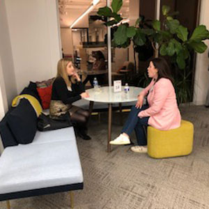 two women speaking at a speed networking event