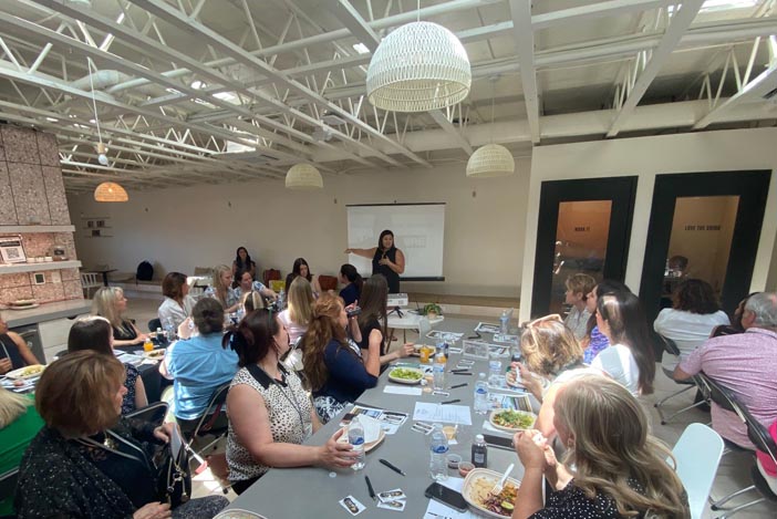 luncheon attendees listening to speaker