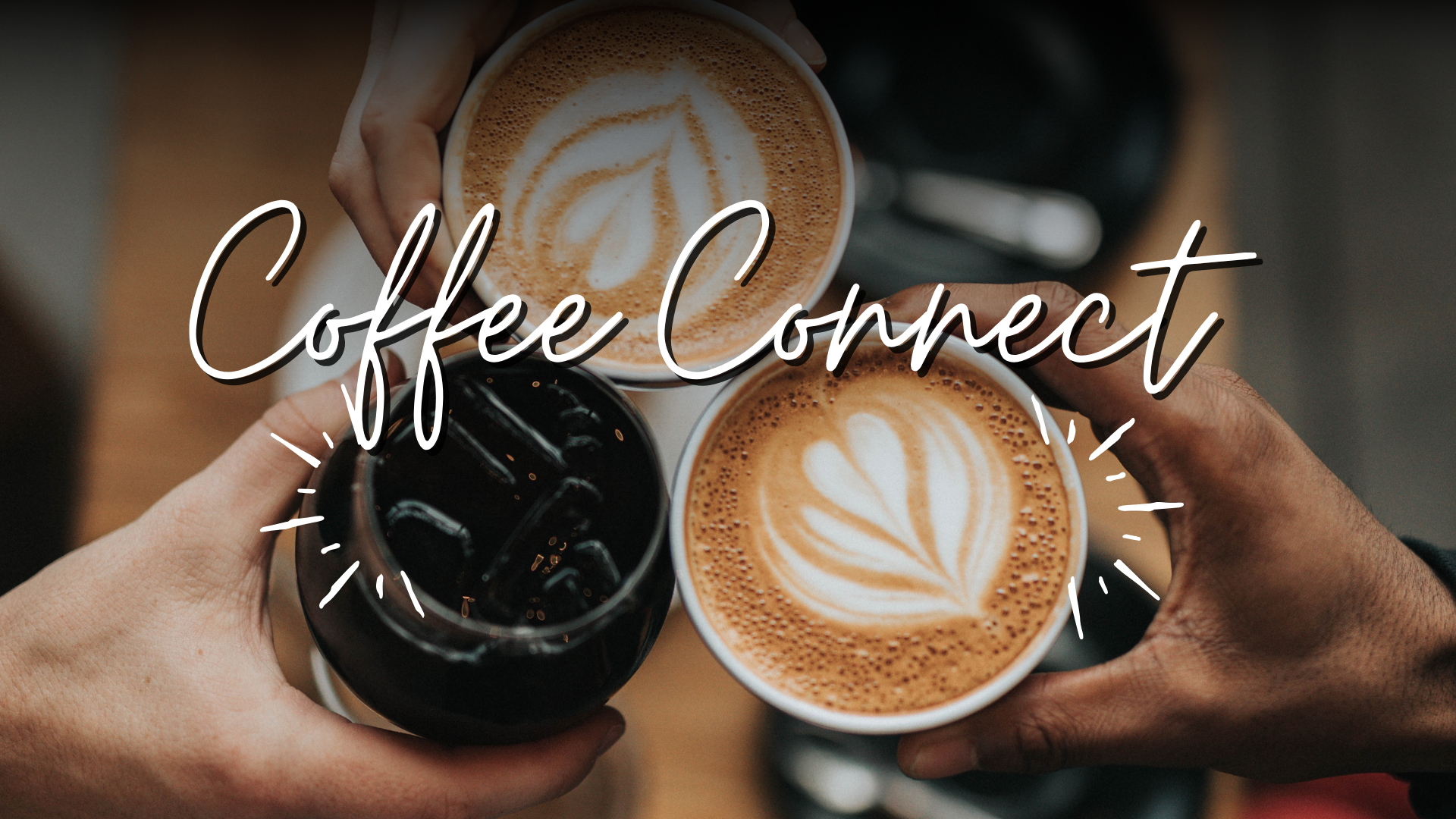Cheers with three hands holding coffee drinks