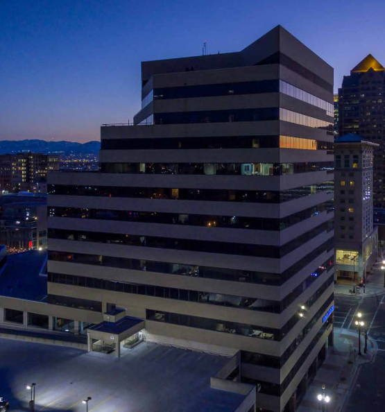 tall office building with evening sky in background